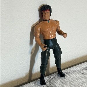 Action Figure with Black Pants and Red Headband